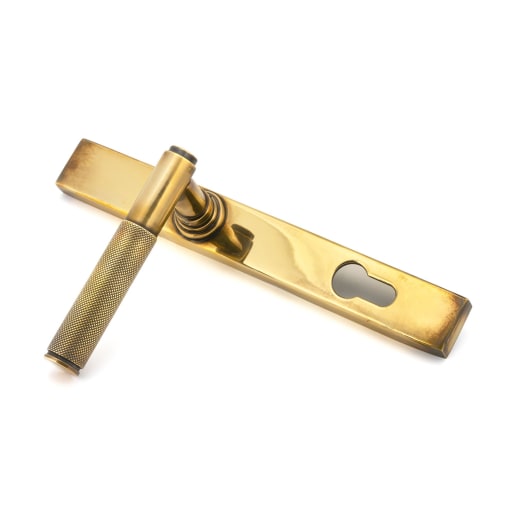 From The Anvil Aged Brass Brompton Slimline Lever Espag. Lock Set