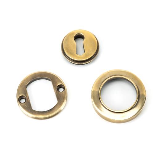 From The Anvil Aged Brass Round Escutcheon (Plain)