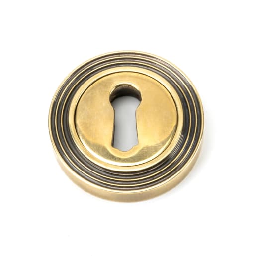 From The Anvil Aged Brass Round Escutcheon (Beehive)